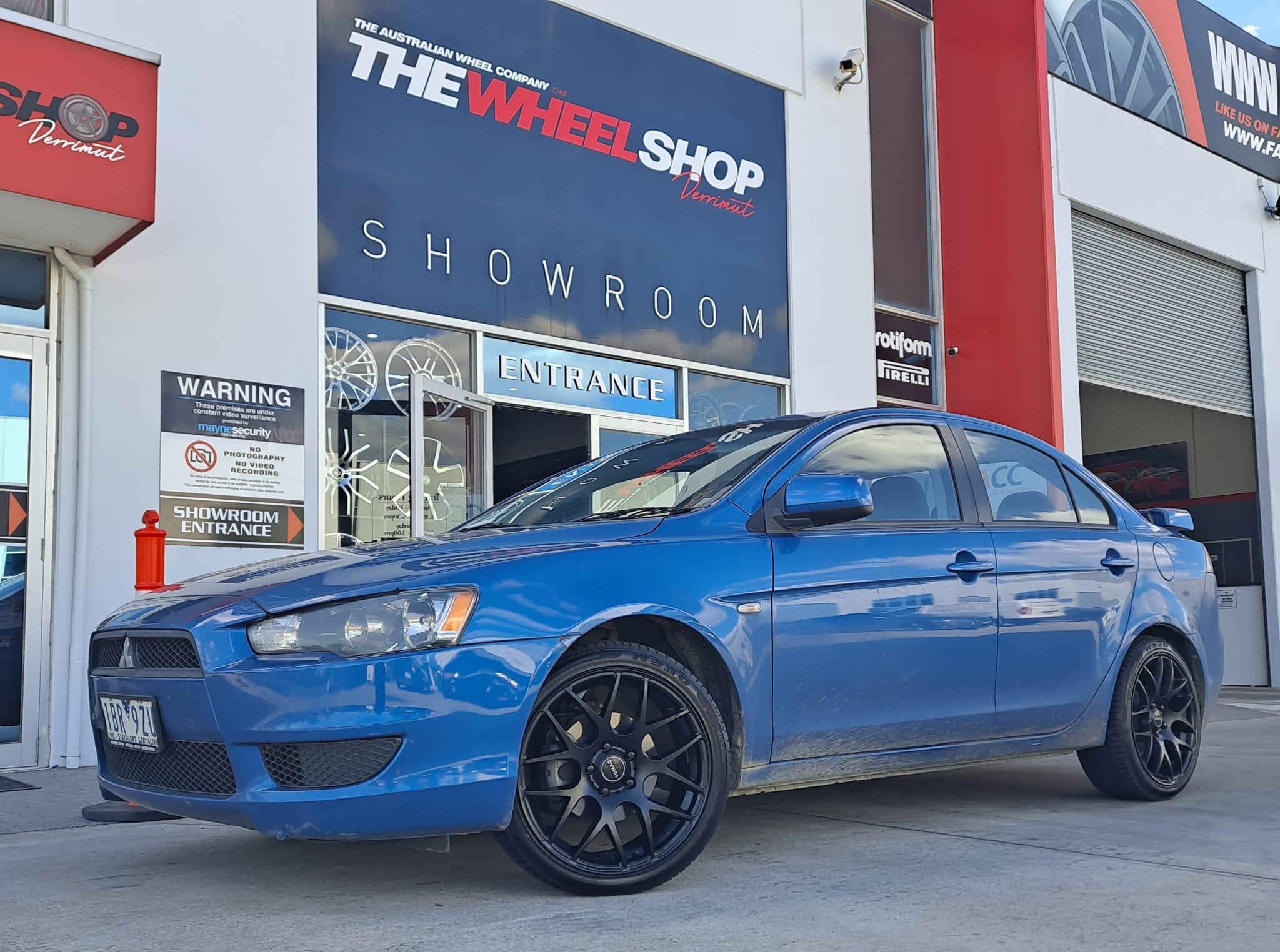MITSUBISHI LANCER WITH ROMAC WHEELS |  | MITSUBISHI